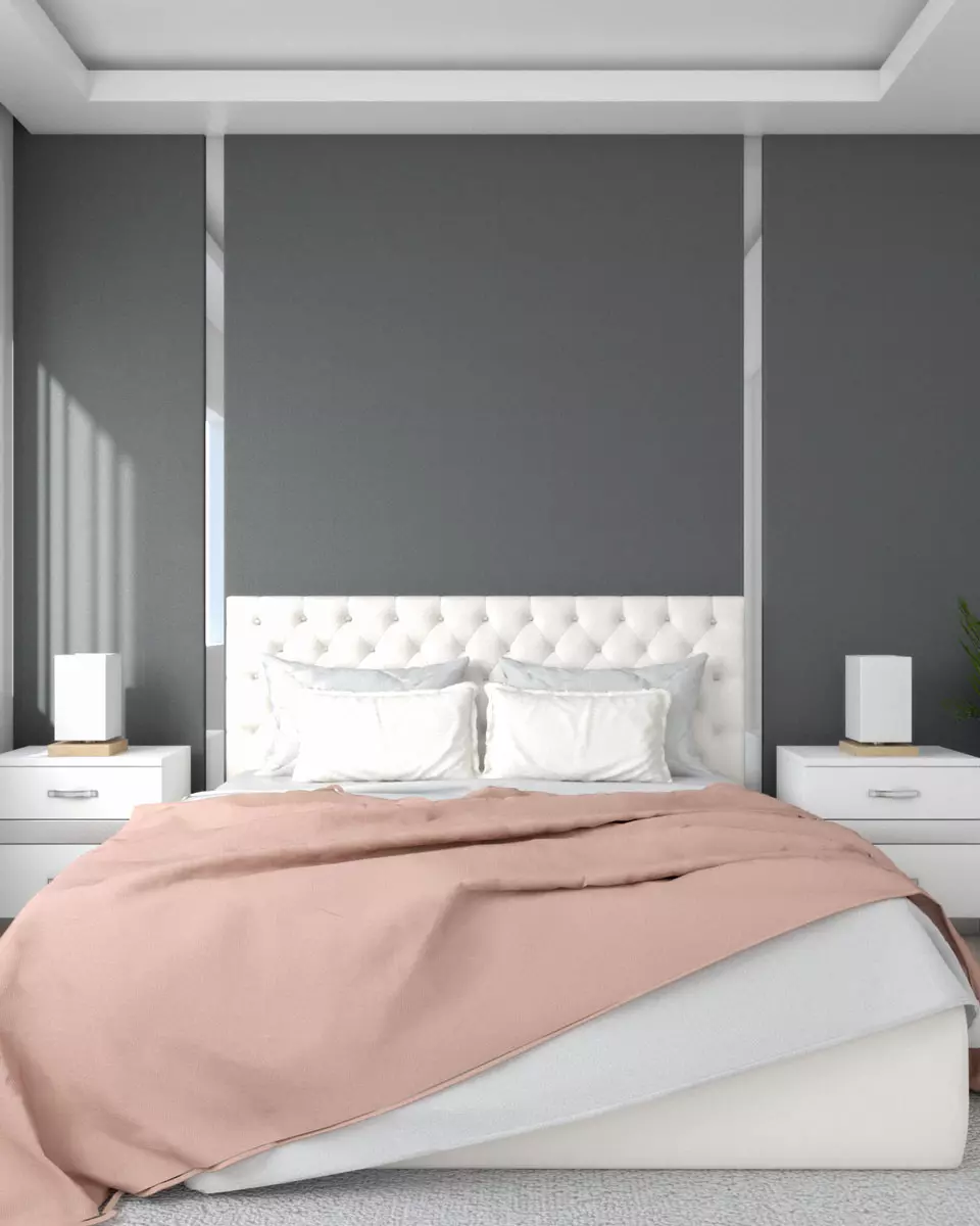 Gray and mirror wall behind bed