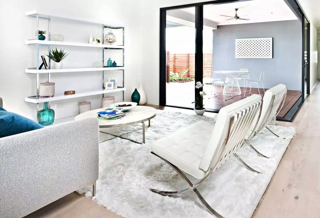 Dining room area with doors, window and simple round table