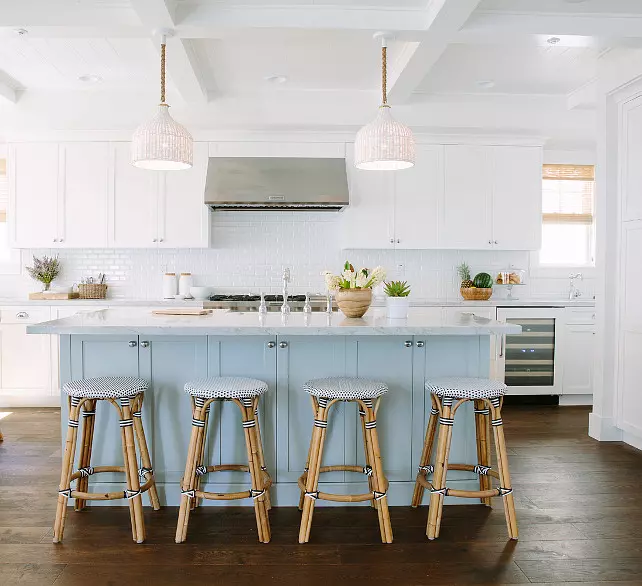 A blue kitchen island painted Wolf Gray by Benjamin Moore