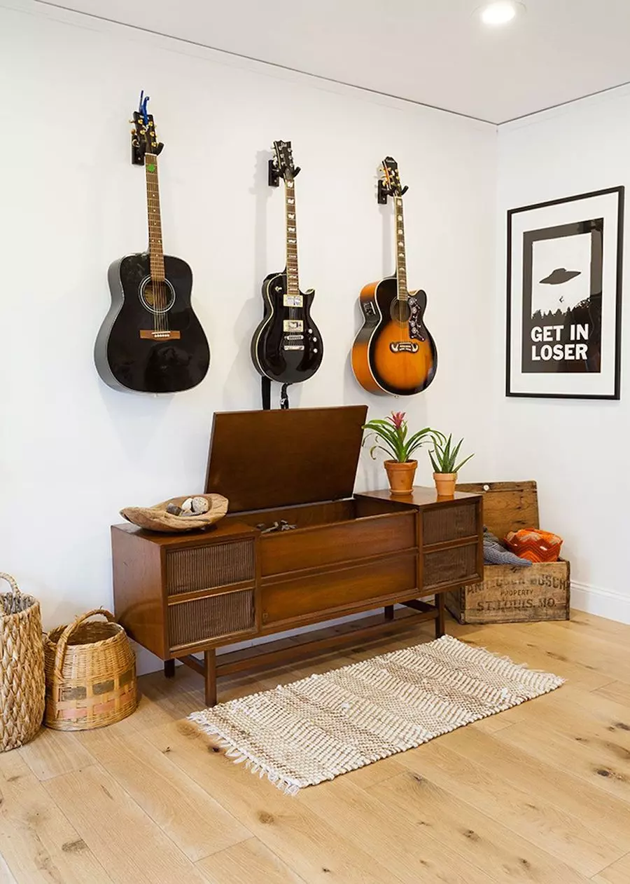 Southwest decor guitar walls vintage records via mackenziecollierinteriors