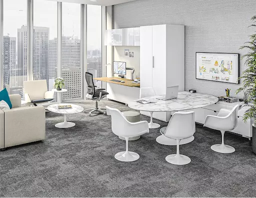 An office with the desk position commanding the room as an office decor idea