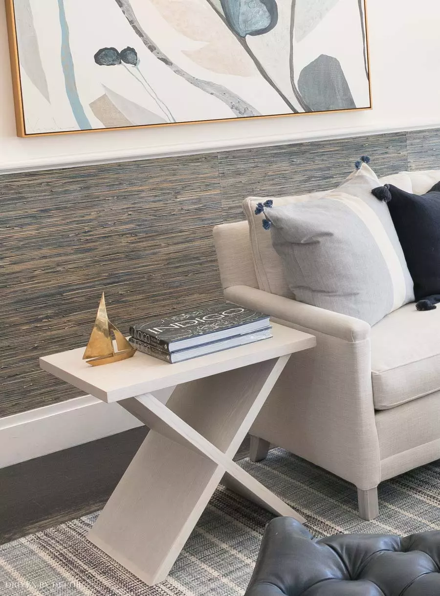 Gorgeous navy blue grasscloth wallpaper! Love how they used it in small amounts below the chair rail.