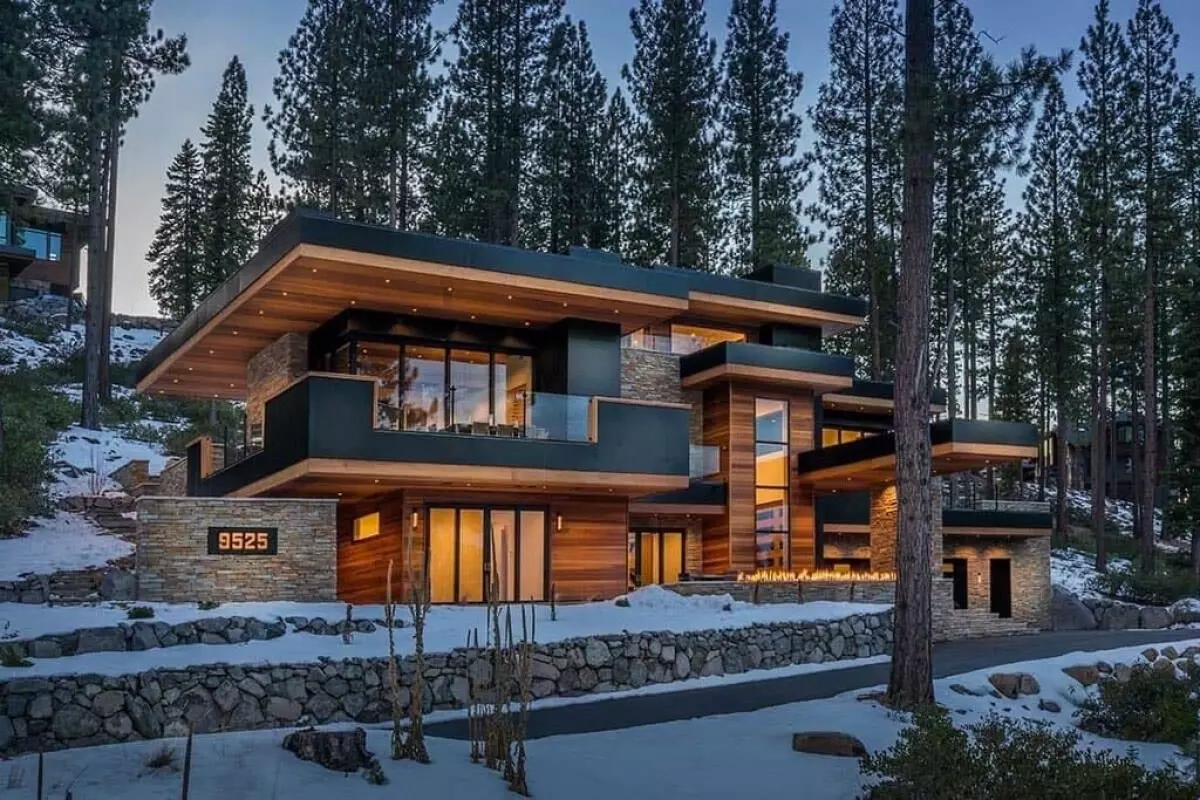 A large Modern Mountain Home in the middle of a forest