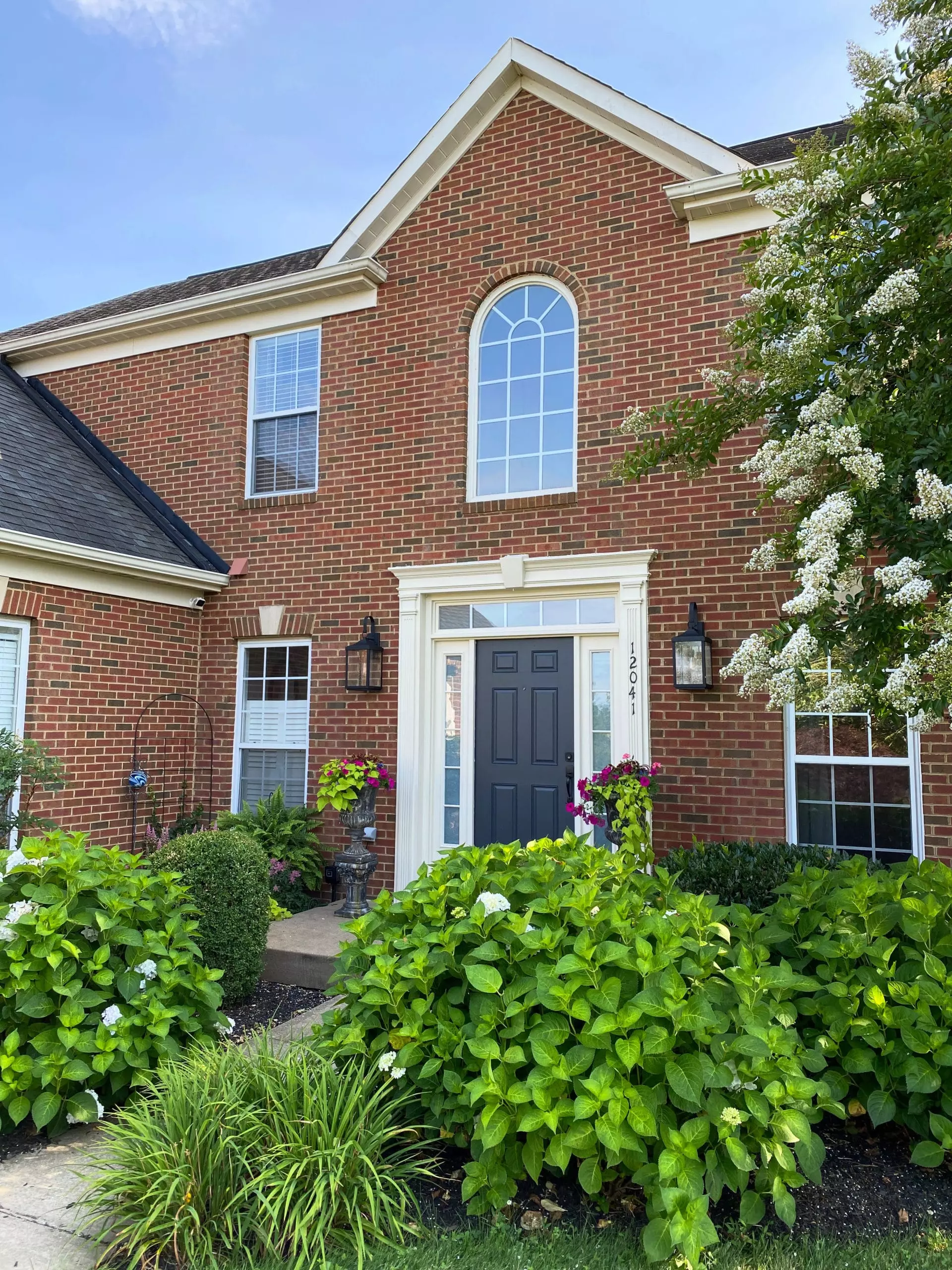 Benjamin Moore Newburyport Blue, dark navy blue for accent wall, cabinets, island, doors, exteriors. Kylie M