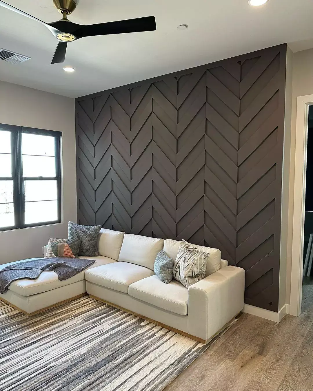 Grey Herringbone Pattern Accent Wall in Living Room