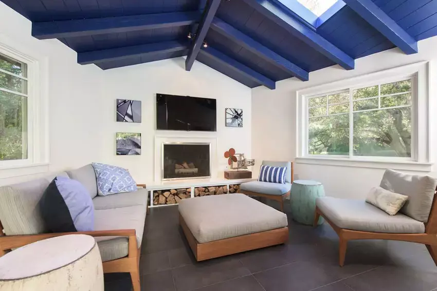 Traditional living room with blue accent wall and sectional couch