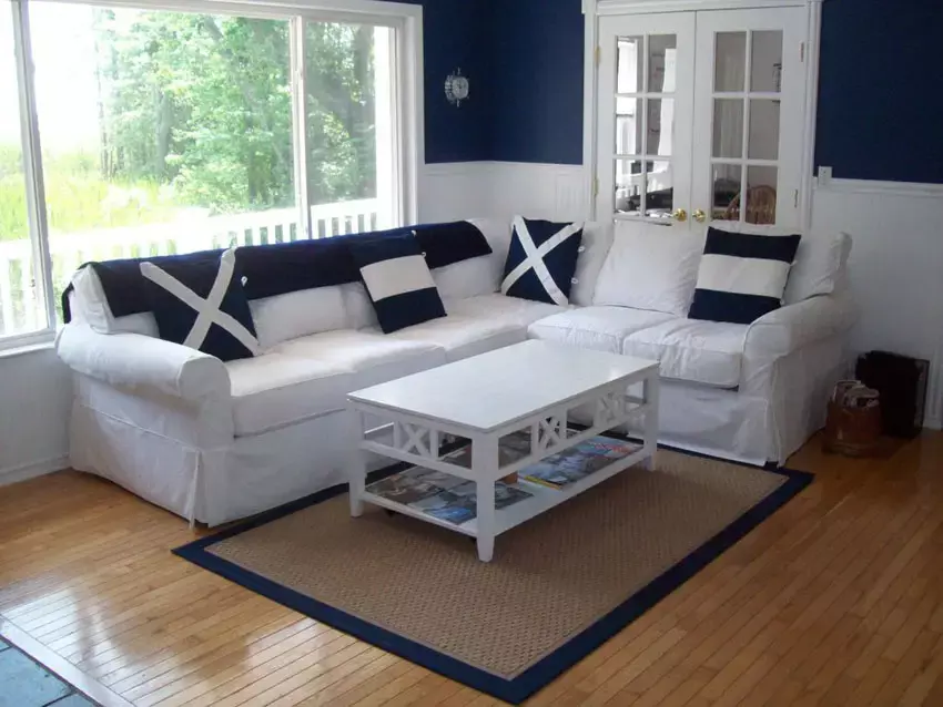 Traditional living room with wicker furniture and blue couch