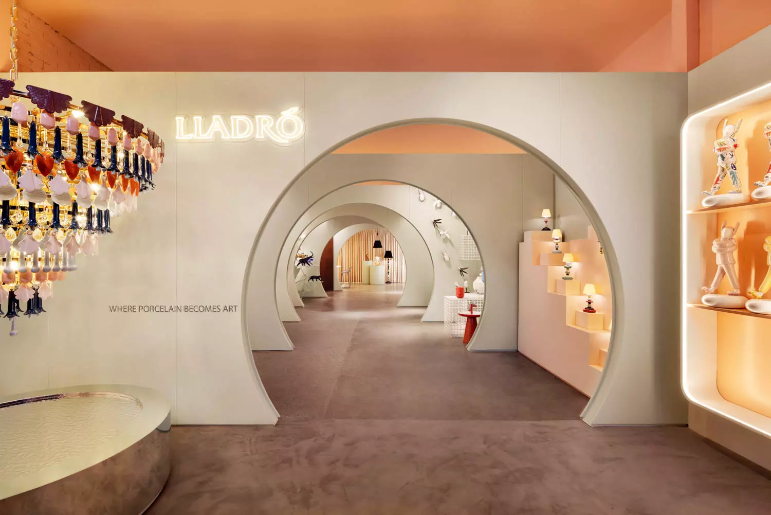 mannequins stand on the base of a winding staircase in a Dior boutique in Paris