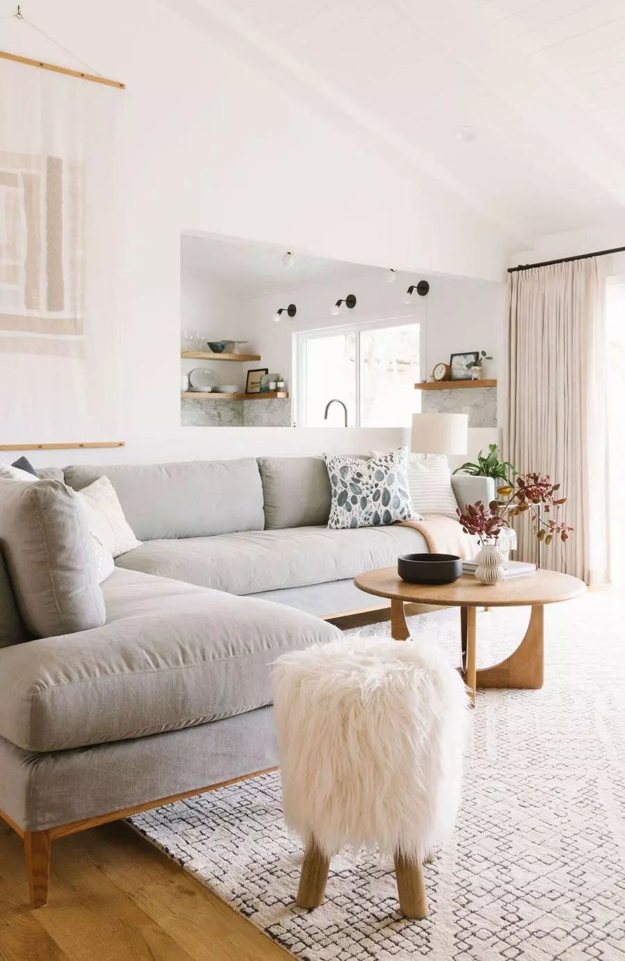 Faux Fur Stool in Scandinavian Living Room via Samantha Gluck