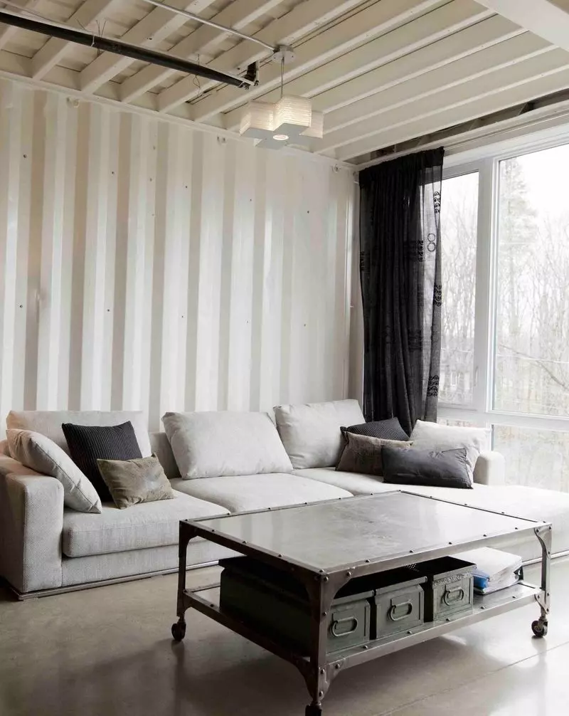 Concrete Coffee Table in Renovated Loft Industrial Living Room via hCO INTERIORS