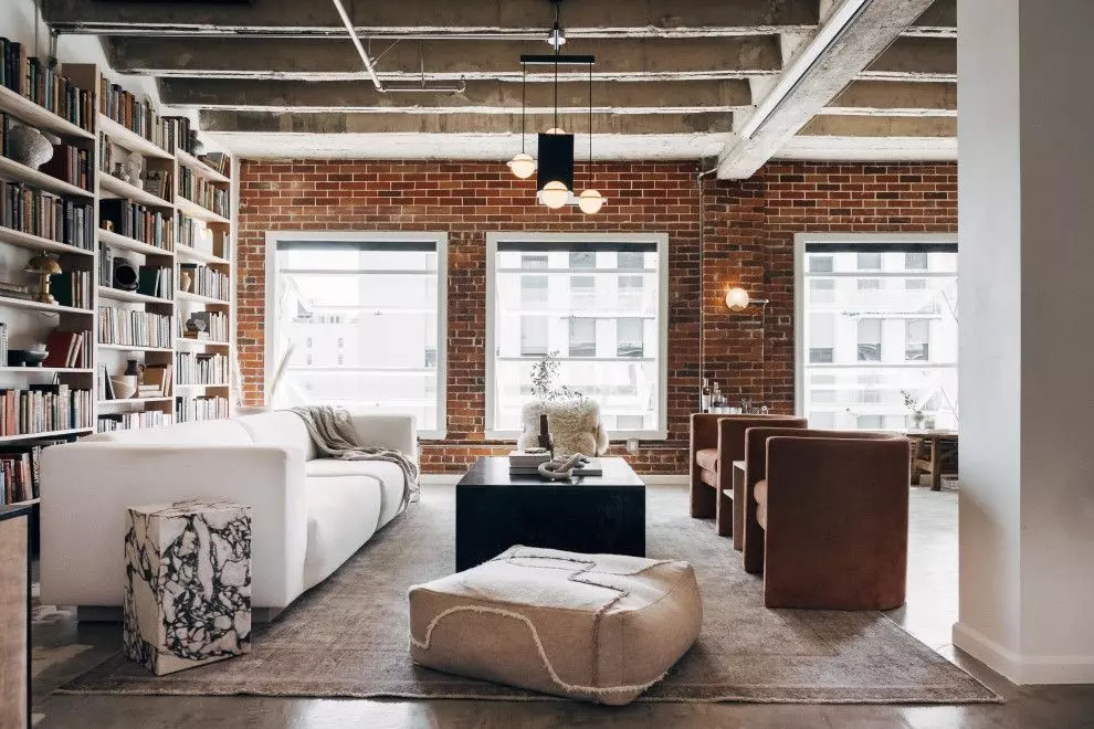 Black Metal Bookcase in Industrial Living Room Design via Insight Vision