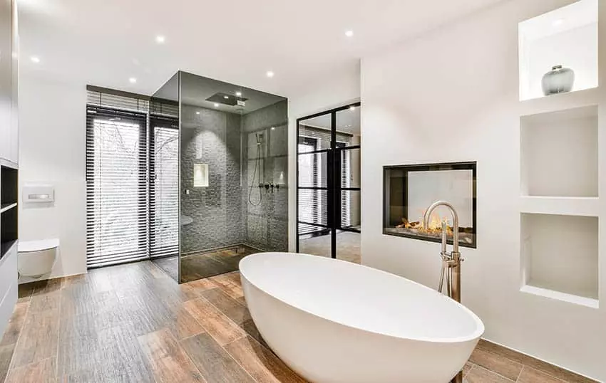 Modern white bathroom with large shower with rainfall showerhead