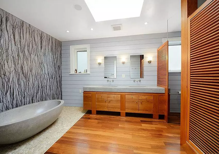 Gray modern master bathroom with drum chandelier