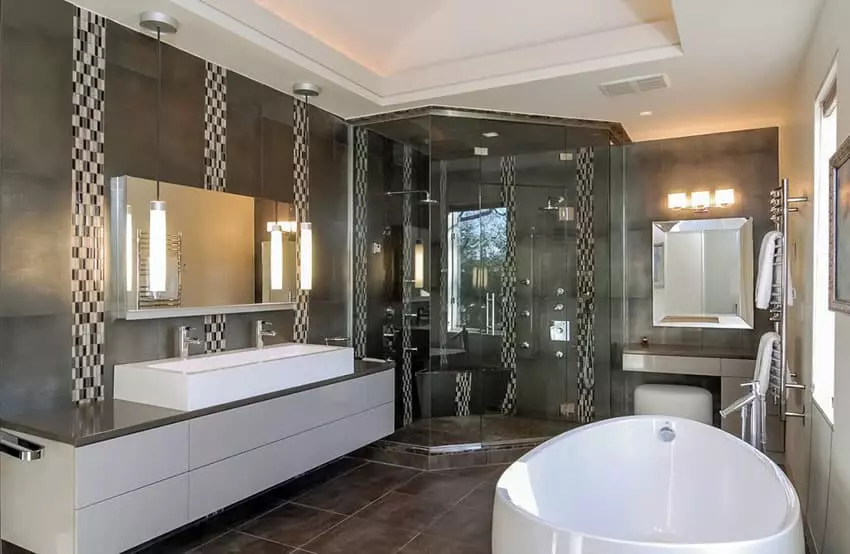 Beautiful white marble modern bathroom with chandelier and high ceilings