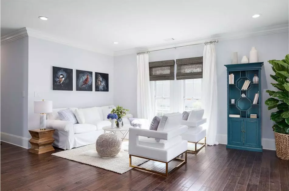 Square ceiling structure and the fireplace for neat Classic styled living room