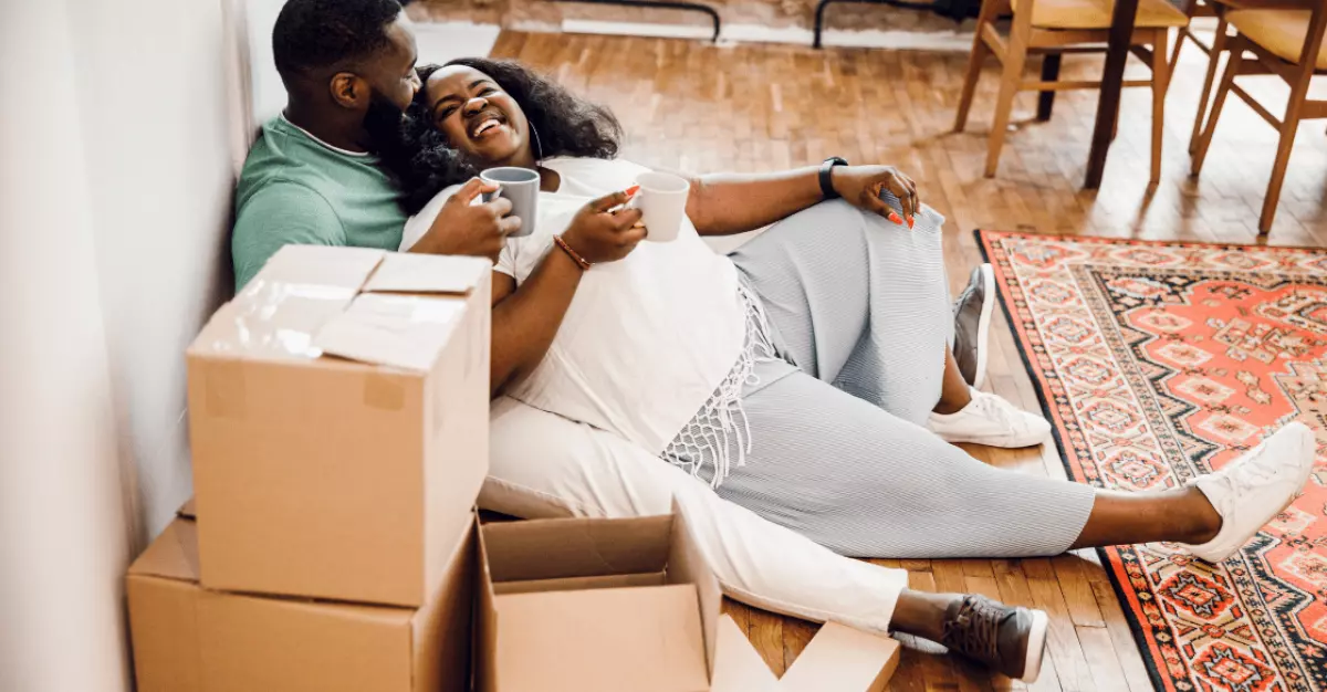 Couple unpacking their new apartment