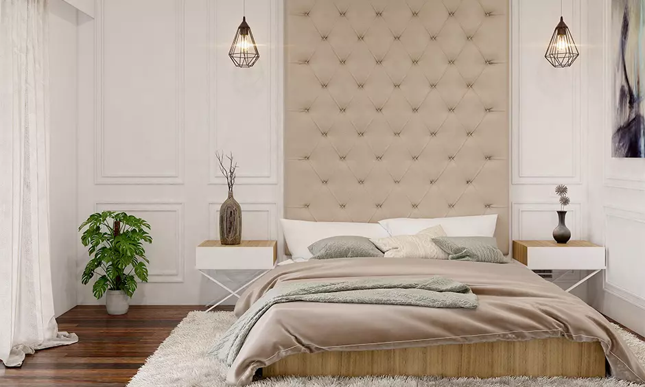 Bedroom in a white modern classic interior design with diamond tufted headboard and geometric lamps lend a contemporary.