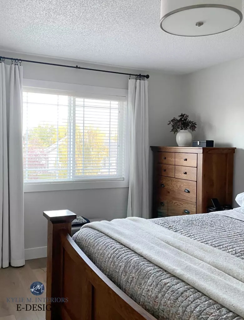 Benjamin Moore Simply White cabinets, Collingwood gray walls, oak flooring.