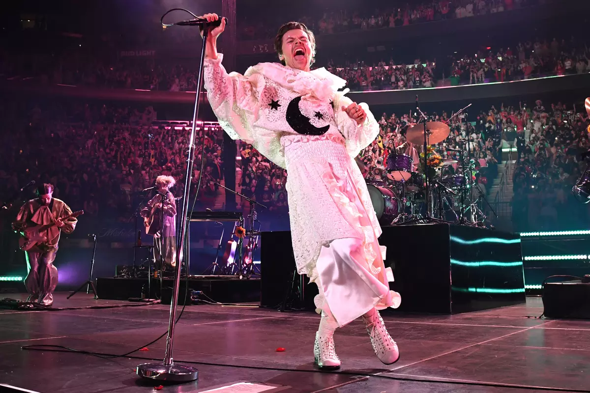 Harry Styles rocks a fabulous frock during his “Harryween” show at Madison Square Garden on Saturday.