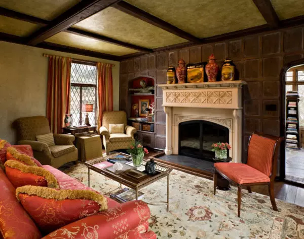 try a tudor style house interior with an open concept family room and warm ambiance