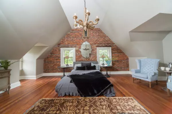 this tudor style house interior is influenced by farmhouse features to create a cozy library