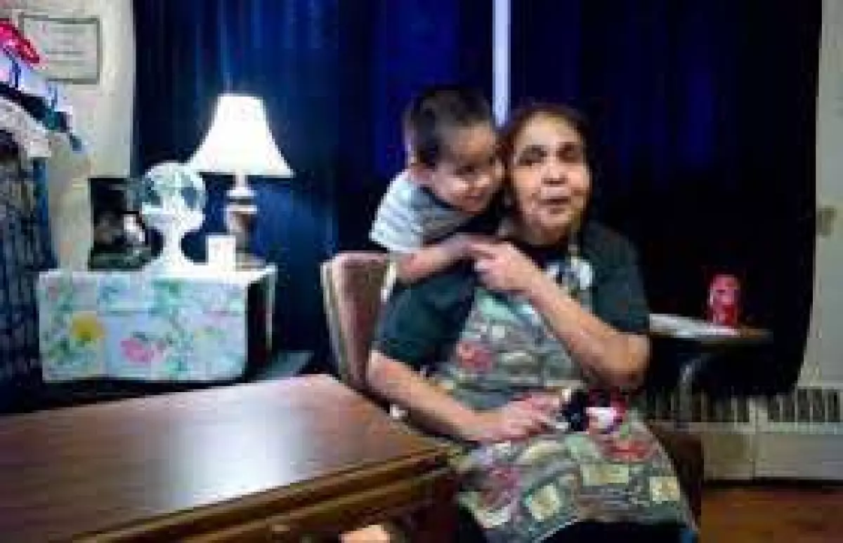 photo of woman and boy in affordable housing unit