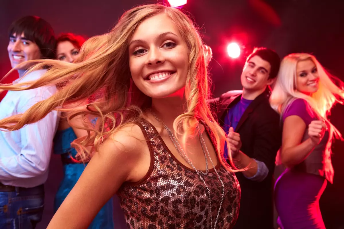 Girl Dancing in Front of Her Friends