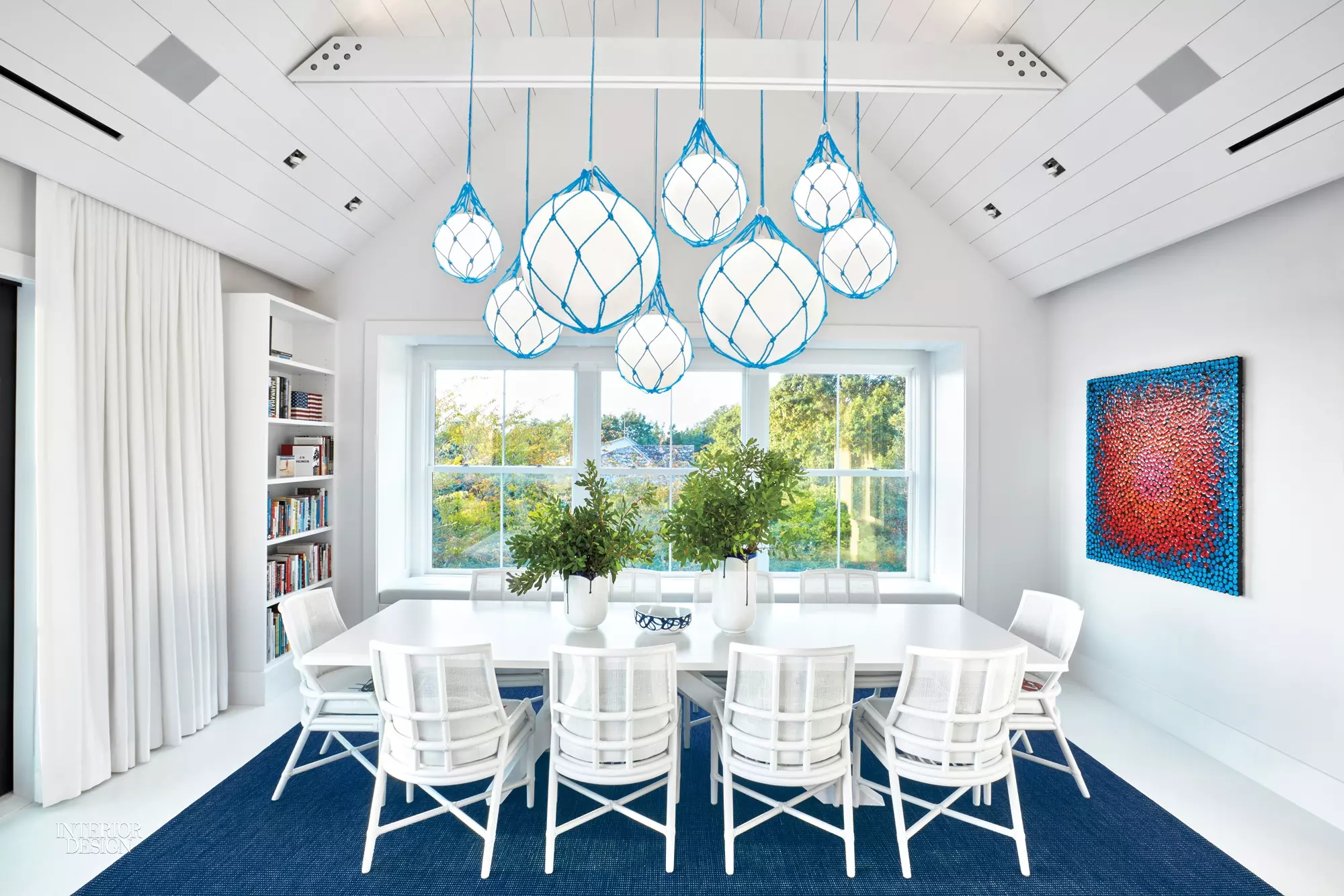 A bright and airy dining room in a Hamptons beach house