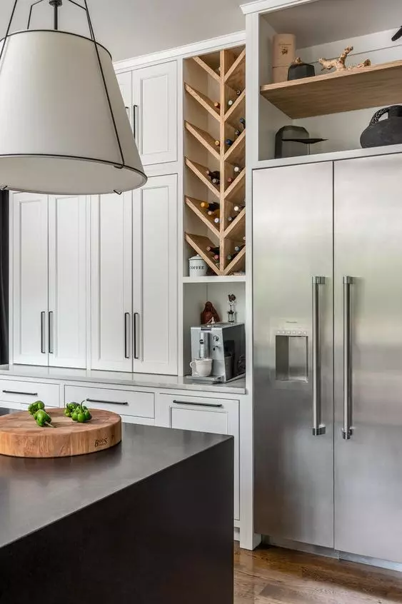 Beautiful kitchen design with a black waterfall island