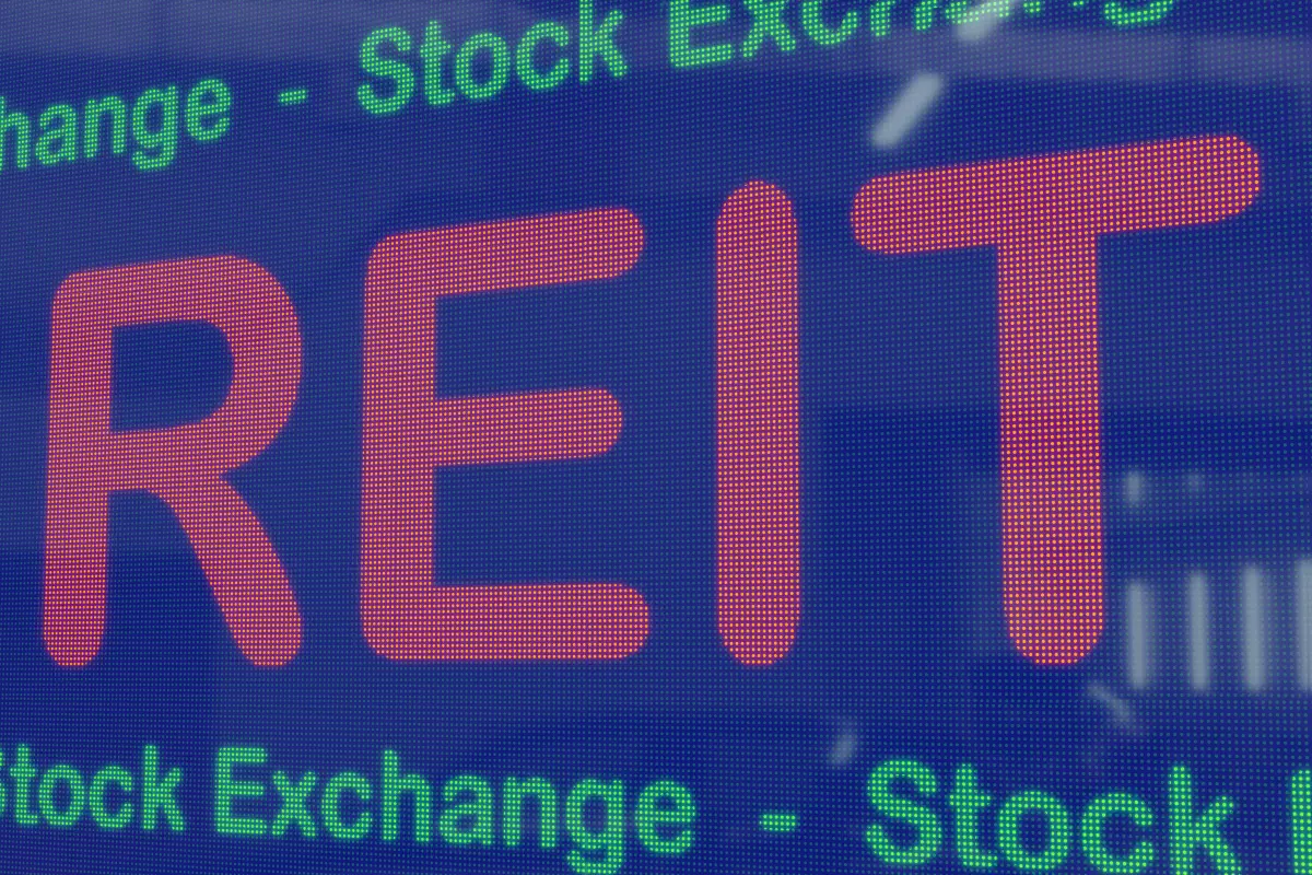 REITs on a blue LED screen