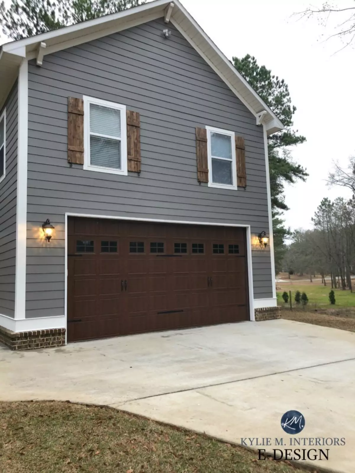 Exterior siding, Sherwin Williams Gauntlet Gray, Pure White trim, brown brick, wood shutters minwax. Kylie M Interiors Edesign, online paint color coach advice