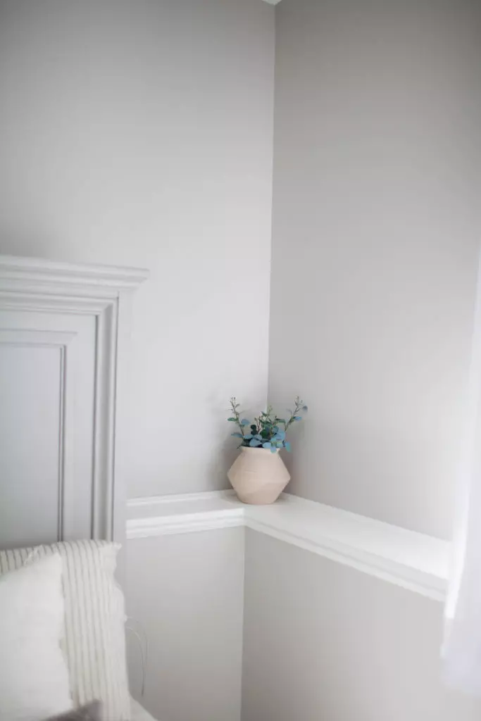 Sherwin Williams Agreeable Gray with white trim, neutral greige wall paint color. Kylie M client photo