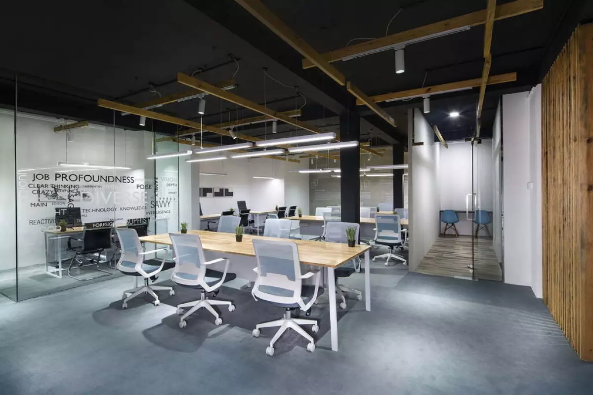 A office room with a wooden table and chairs