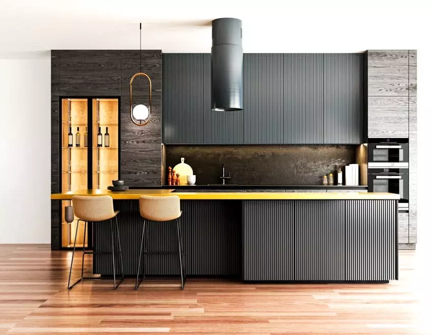 Kitchen with built-in dry bar, cabinets made of wood and wine holders