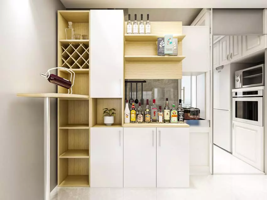 Bar area with wine holders, glass cabinets and butcher