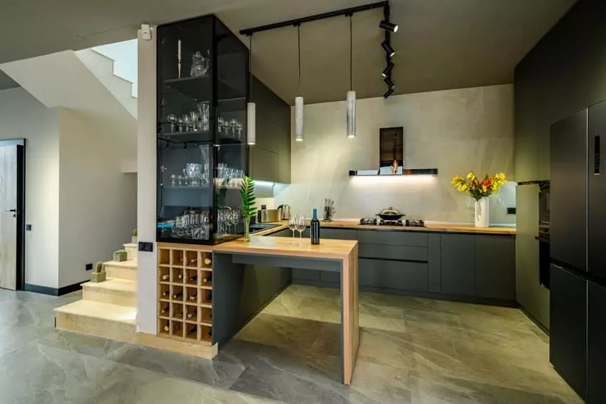 Brass counter chairs, granite countertop with blue base