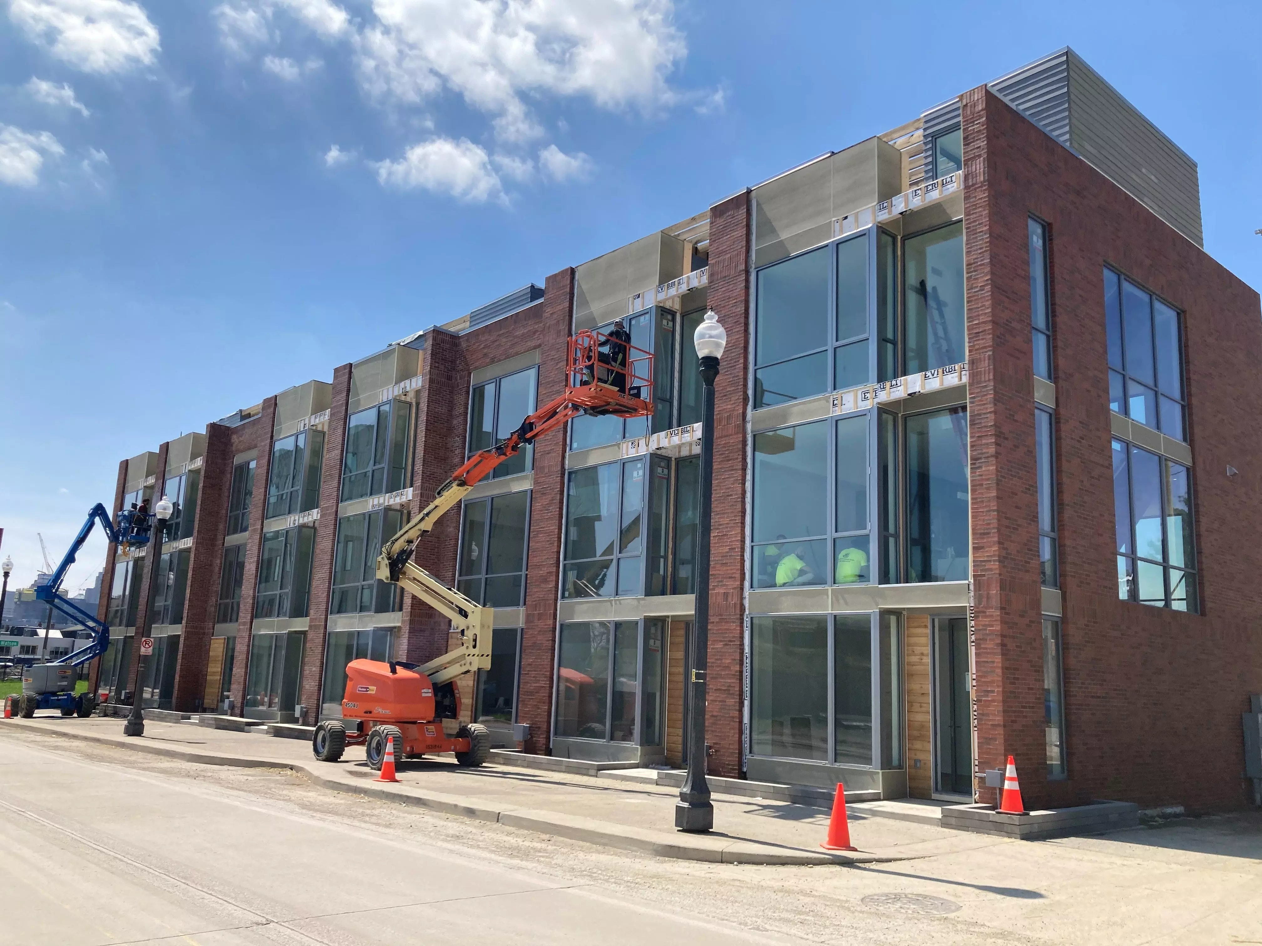 Construction workers were nearing completion of new upscale condos in Detroit