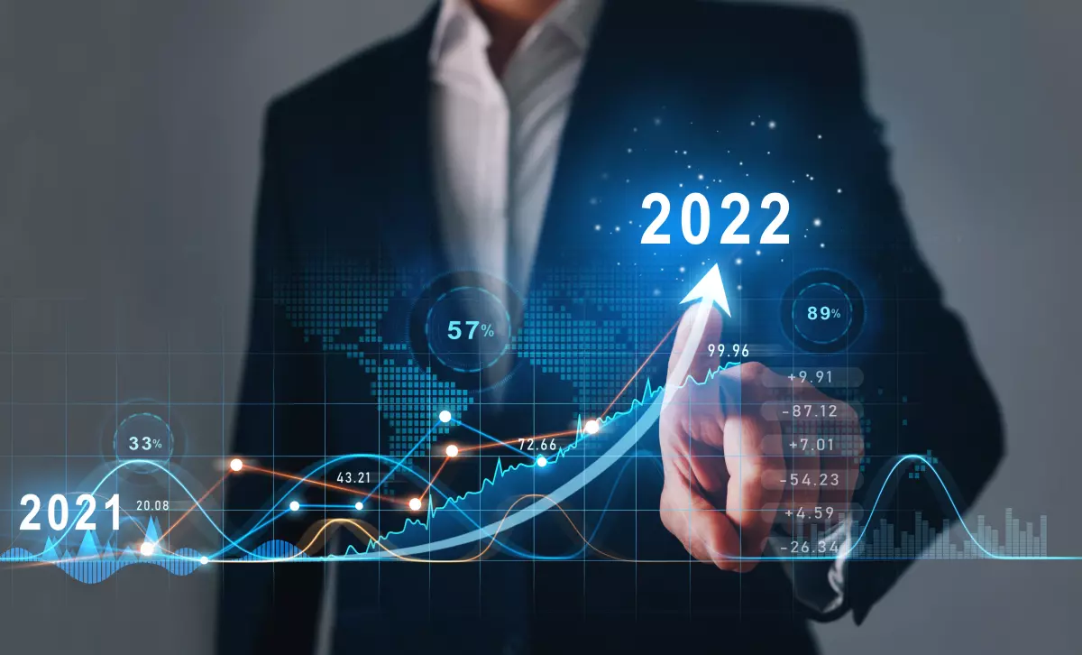 Businessman draws increase arrow graph corporate future growth year 2021 to 2022. Development to success and motivation.