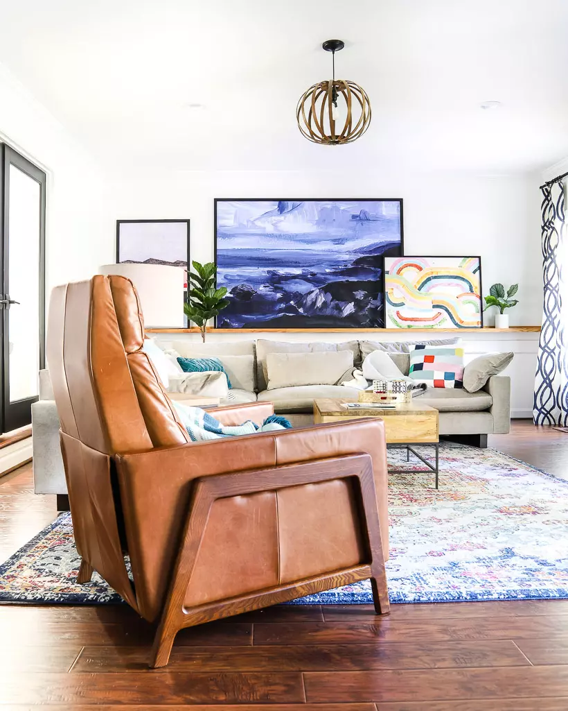 leather West Elm Spencer recliner in a colorful family room