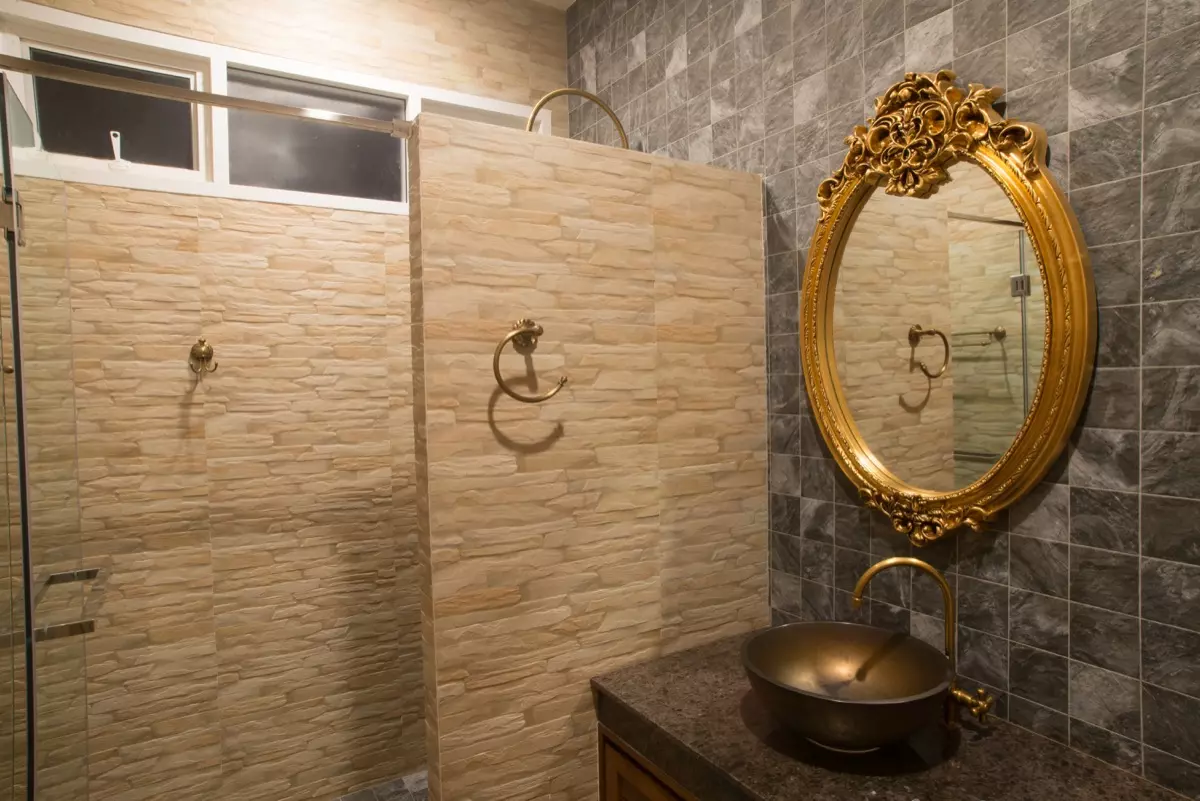 powder room with striped wallpaper