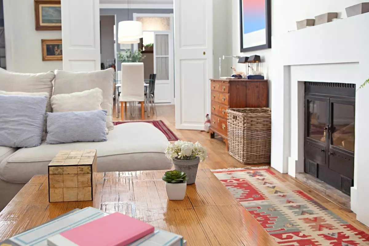 retro living room with green velvet chair and couch