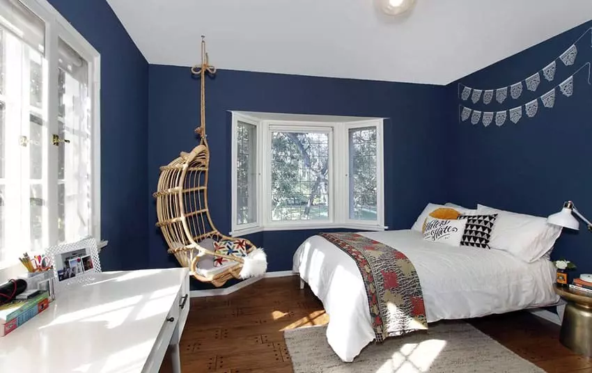 Kids bedroom with hanging nest chair