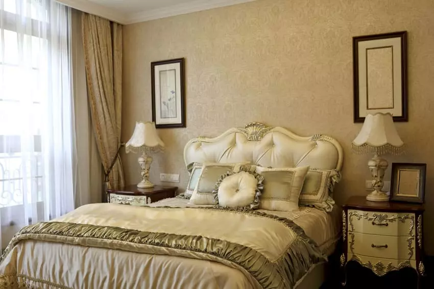 Romantic bedroom with four-post bed and curtains