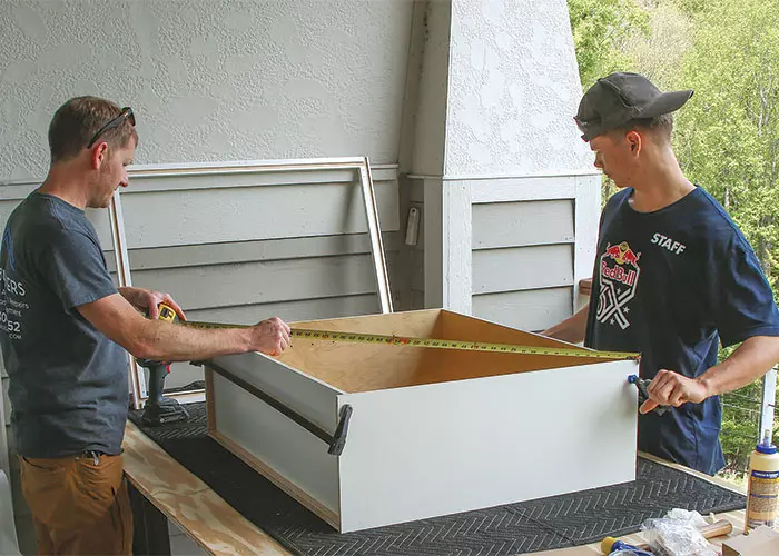 gluing sides of cabinet