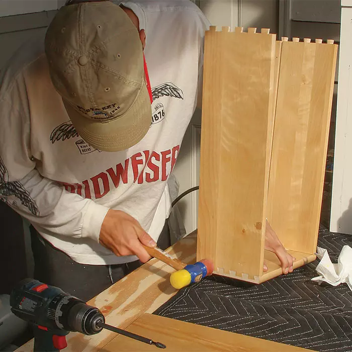 applying glue to dovetails