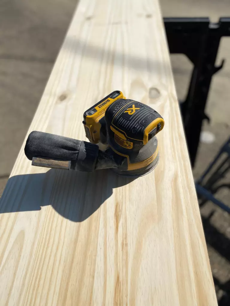 sanding wood for the bar cabinet diy