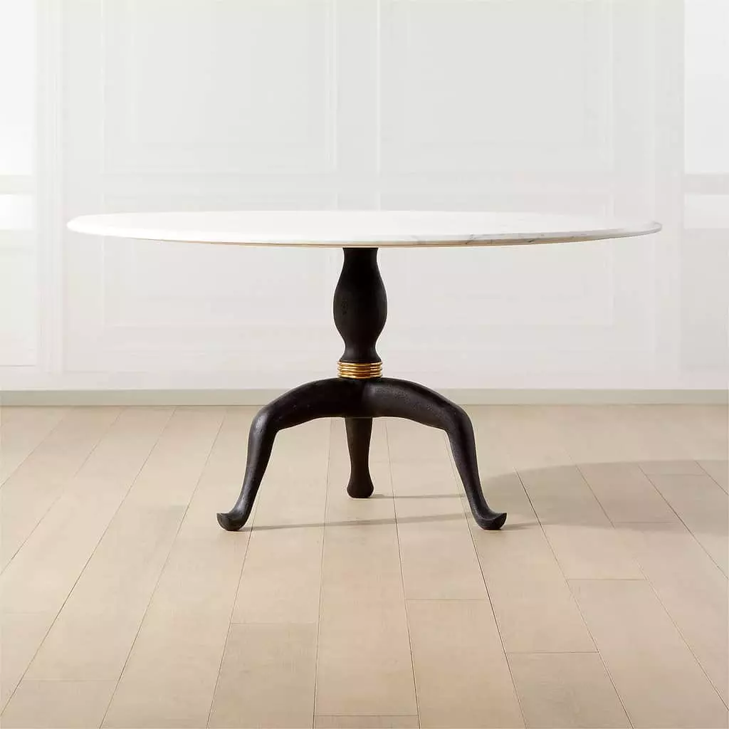 a dining table with a modern marble top