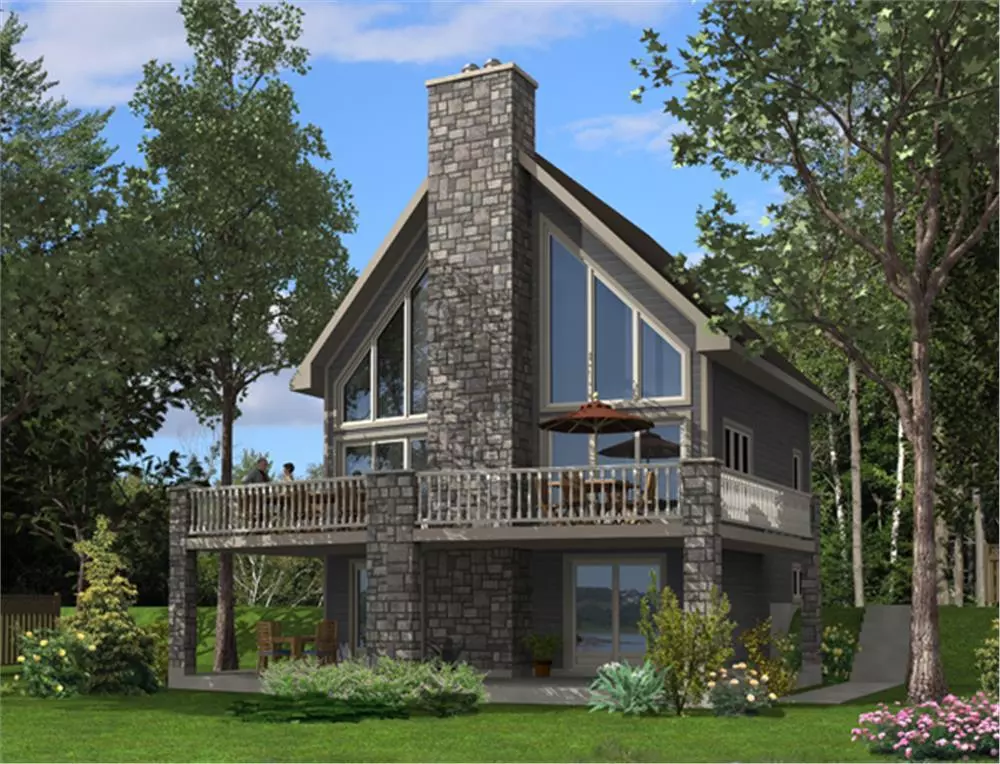 Mountainside view of House Plan #161-1000 at night