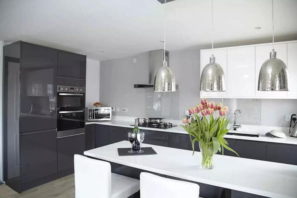 Contemporary kitchen dark gray high gloss cabinets white quartz cabinets silver pendant lights