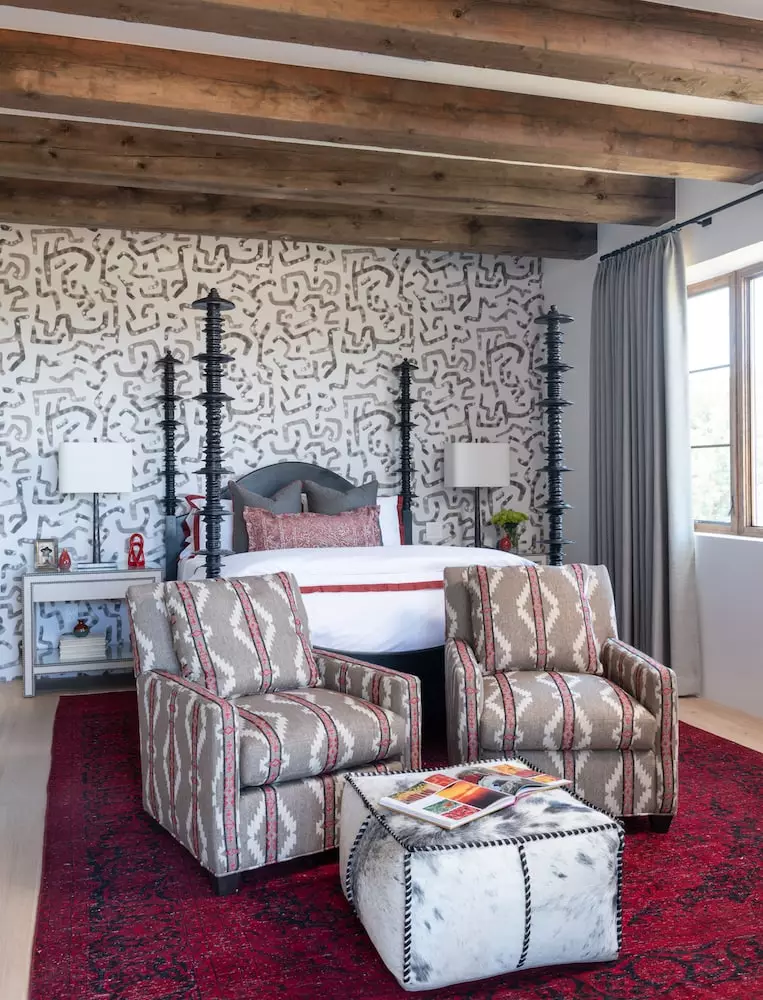 Lobo-themed guest bedroom with tribal print-inspired accent wall by Laura U